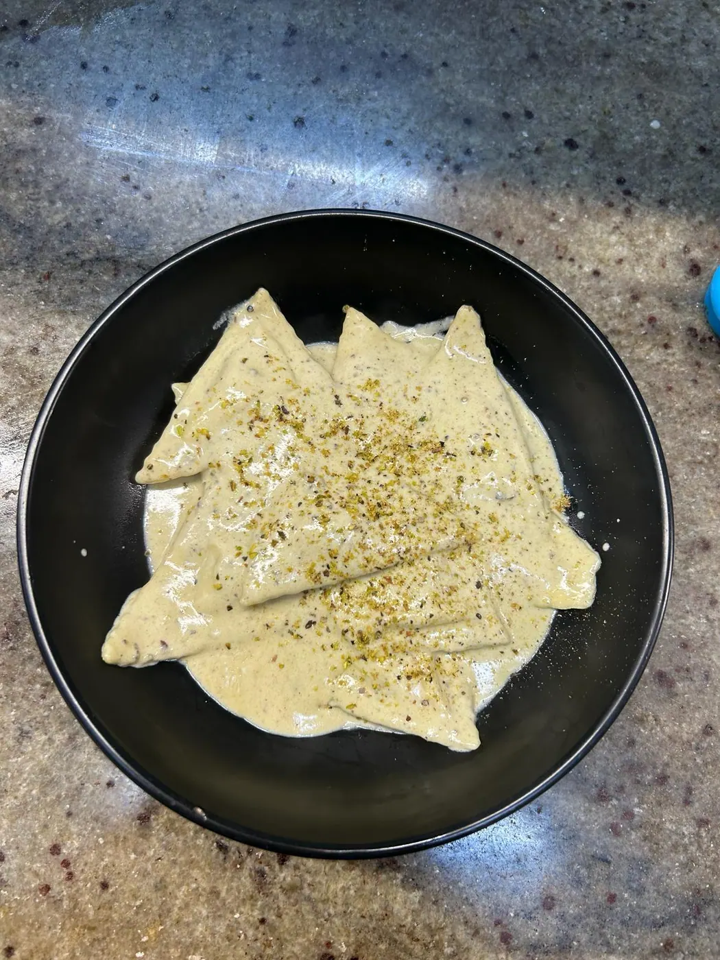 Ravioli con formaggio grattugiato — Sikania